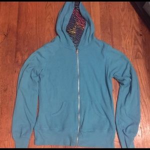 Reversible teal/zebra print sweatshirt